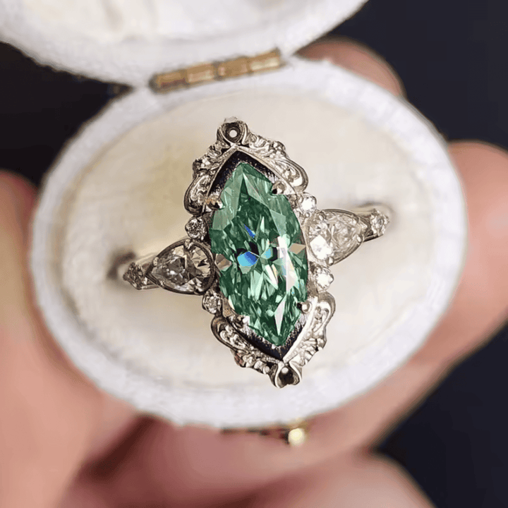 Emerald Marquise Halo Ring